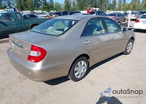 2002 Toyota Camry Le z USA, uszkodzony, nr VIN 4T1BE32K82U534669